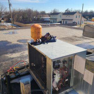 Walkin beer cooler down.  Low charge and no high pressure control for low ambient operations. Add gas and install head pressure controls. Waco Food Mart Oceans