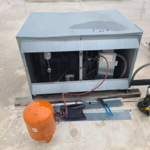 Walkin flower cooler is warm due to a low charge. Leak search found leak at right evaporator which needs to be replaced