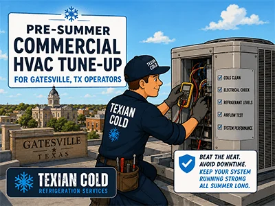 Commercial HVAC technician inspecting a rooftop AC condenser at a Gatesville, TX restaurant before summer
