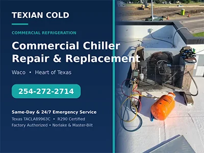 Technician gauges on a rooftop commercial chiller condenser during a repair evaluation in Waco, TX
