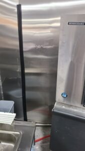 A stray car ran thru a brick wall and knocked this uce machine off its rocker. Hoshizaki is one tough machine.