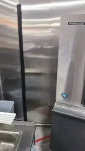 A stray car ran thru a brick wall and knocked this uce machine off its rocker. Hoshizaki is one tough machine.