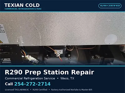 Technician servicing a commercial R290 prep station refrigeration unit at a Waco, TX kitchen
