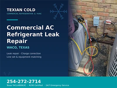 Manifold gauges connected to a commercial air conditioning condenser during a refrigerant leak repair in Waco, TX
