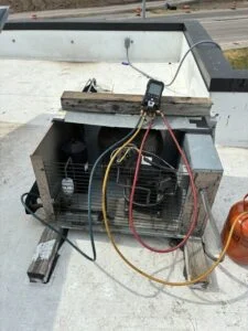 Walk-in cooler refrigeration equipment serviced for a temperature problem at a Waco, TX commercial facility